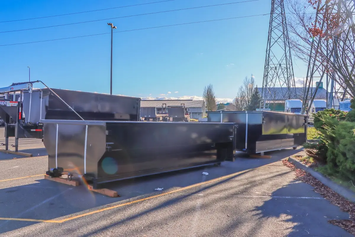 Roll-off dumpster ready for waste disposal at job site for 12 Yard Dumpster Rental in Center